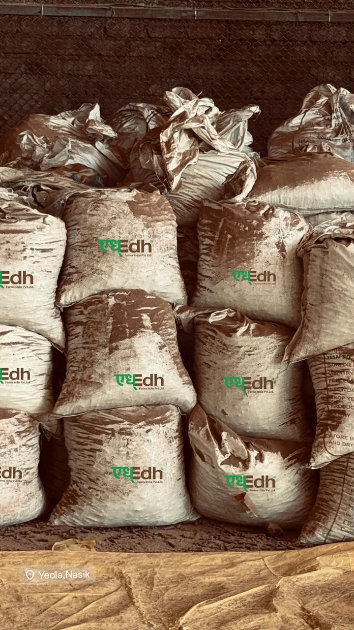 Branded biomass sacks in storage